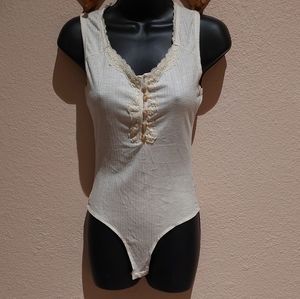 Beige sleeveless bodysuit